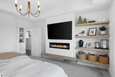 Welcome to 2764 W Crown Drive--a stunning 2022 ranch-style home on Crown Golf Course in Michigan - for sale on GolfHomes.com, golf home, golf lot