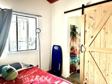 This large parcel with updated, single level 3 bed/2 bath home on Waikoloa Village Golf Club in Hawaii - for sale on GolfHomes.com, golf home, golf lot