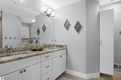 Welcome to 2764 W Crown Drive--a stunning 2022 ranch-style home on Crown Golf Course in Michigan - for sale on GolfHomes.com, golf home, golf lot