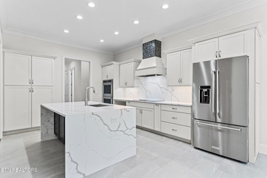 Beautiful brick and stone home with custom upgrades throughout on Tellico Village -The Links At Kahite Golf Course in Tennessee - for sale on GolfHomes.com, golf home, golf lot