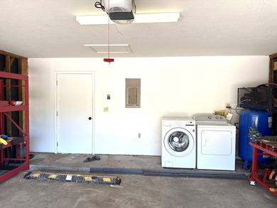 This large parcel with updated, single level 3 bed/2 bath home on Waikoloa Village Golf Club in Hawaii - for sale on GolfHomes.com, golf home, golf lot