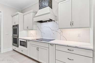 Beautiful brick and stone home with custom upgrades throughout on Tellico Village -The Links At Kahite Golf Course in Tennessee - for sale on GolfHomes.com, golf home, golf lot