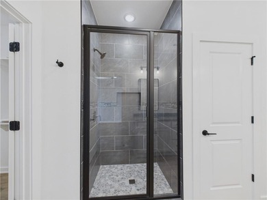 This inviting new construction Bella Vista home sits in a prime on Branchwood Golf Course in Arkansas - for sale on GolfHomes.com, golf home, golf lot