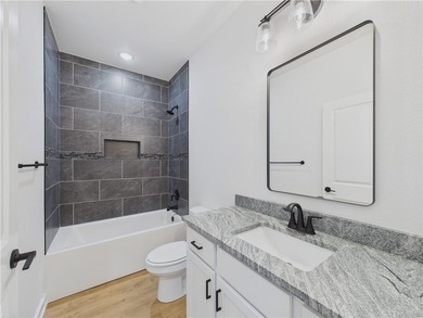 This inviting new construction Bella Vista home sits in a prime on Branchwood Golf Course in Arkansas - for sale on GolfHomes.com, golf home, golf lot