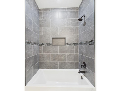 This inviting new construction Bella Vista home sits in a prime on Branchwood Golf Course in Arkansas - for sale on GolfHomes.com, golf home, golf lot