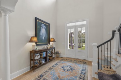 This Lowcountry Estate sits on a park-like private lot with on Dunes West Golf Club in South Carolina - for sale on GolfHomes.com, golf home, golf lot