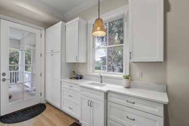 This Lowcountry Estate sits on a park-like private lot with on Dunes West Golf Club in South Carolina - for sale on GolfHomes.com, golf home, golf lot