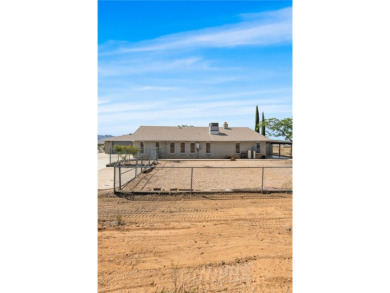 This delightful 5-bedroom, 2-bath residence offers the perfect on Valle Vista Golf Course in Arizona - for sale on GolfHomes.com, golf home, golf lot