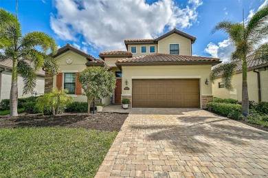 Under contract-accepting backup offers. Nestled within the on Lakewood National Golf Club in Florida - for sale on GolfHomes.com, golf home, golf lot