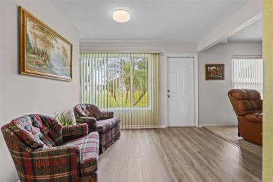Enjoy affordable living with golf course views in the on Highland Fairways Golf Club in Florida - for sale on GolfHomes.com, golf home, golf lot