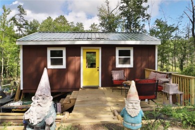 Enjoy the best of the Northwoods with this newly constructed on Hardwoods Golf Club At Mille Lacs in Minnesota - for sale on GolfHomes.com, golf home, golf lot