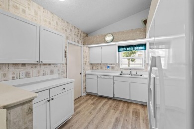 Enjoy affordable living with golf course views in the on Highland Fairways Golf Club in Florida - for sale on GolfHomes.com, golf home, golf lot