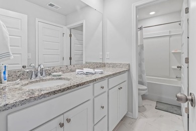 Well-maintained and thoughtfully designed, this five-bedroom on Pine Lakes Country Club in South Carolina - for sale on GolfHomes.com, golf home, golf lot