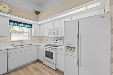 Enjoy affordable living with golf course views in the on Highland Fairways Golf Club in Florida - for sale on GolfHomes.com, golf home, golf lot