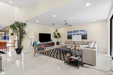 Contemporary penthouse in Eastgate at Hunters Run Country Club on  in Florida - for sale on GolfHomes.com, golf home, golf lot