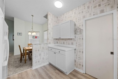 Enjoy affordable living with golf course views in the on Highland Fairways Golf Club in Florida - for sale on GolfHomes.com, golf home, golf lot