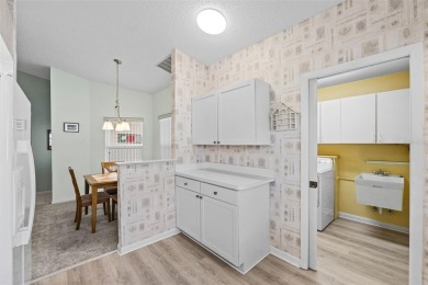 Enjoy affordable living with golf course views in the on Highland Fairways Golf Club in Florida - for sale on GolfHomes.com, golf home, golf lot
