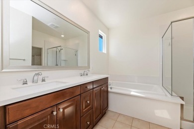 Step into this charming single-story retreat tucked away in a on Goose Creek Golf Course in California - for sale on GolfHomes.com, golf home, golf lot