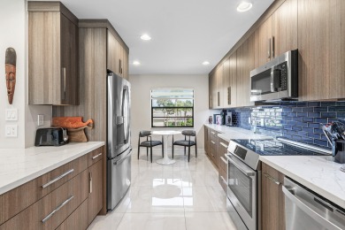Contemporary penthouse in Eastgate at Hunters Run Country Club on  in Florida - for sale on GolfHomes.com, golf home, golf lot