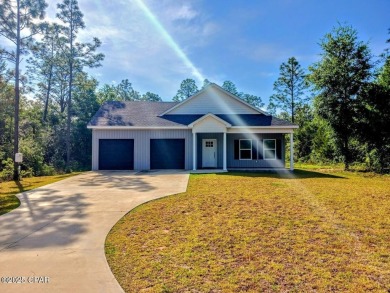 Brand New Home in Sunny Hills, not far from the Florida on Sunny Hills Golf and Country Club in Florida - for sale on GolfHomes.com, golf home, golf lot
