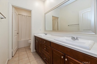 Step into this charming single-story retreat tucked away in a on Goose Creek Golf Course in California - for sale on GolfHomes.com, golf home, golf lot