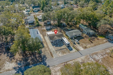 What are the three most important things to consider when buying on Oyster Bay Golf Links in North Carolina - for sale on GolfHomes.com, golf home, golf lot