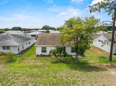 Enjoy affordable living with golf course views in the on Highland Fairways Golf Club in Florida - for sale on GolfHomes.com, golf home, golf lot