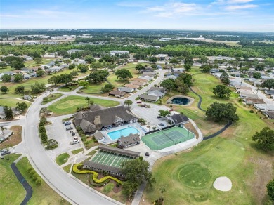Enjoy affordable living with golf course views in the on Highland Fairways Golf Club in Florida - for sale on GolfHomes.com, golf home, golf lot