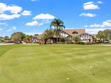 Enjoy affordable living with golf course views in the on Highland Fairways Golf Club in Florida - for sale on GolfHomes.com, golf home, golf lot