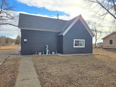 Step inside and see the beauty of 90 South Street in Akron on Akron Golf Course in Iowa - for sale on GolfHomes.com, golf home, golf lot