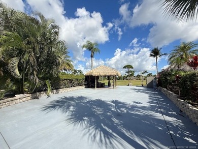 Prime Lakefront Lot on *Millionaire's Row* - Fully Furnished! on Motorcoach Resort Golf Course in Florida - for sale on GolfHomes.com, golf home, golf lot