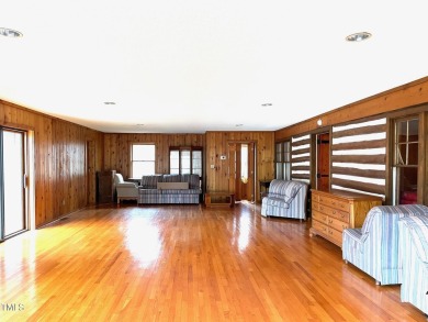No need to go the mountains!! This  picturesque original log on Carolina Trace Country Club in North Carolina - for sale on GolfHomes.com, golf home, golf lot