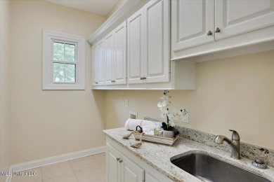 CLICK ON VIRTUAL TOURWelcome to this beautifully updated home on Lake Caroline Golf Club in Mississippi - for sale on GolfHomes.com, golf home, golf lot