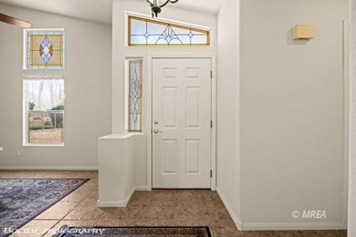 Welcome to 1221 Pebble Beach Dr in Sunset Greens, a gated golf on CasaBlanca Resort and Casino in Nevada - for sale on GolfHomes.com, golf home, golf lot