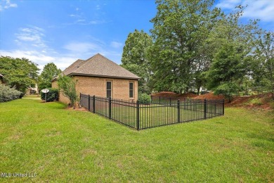 CLICK ON VIRTUAL TOURWelcome to this beautifully updated home on Lake Caroline Golf Club in Mississippi - for sale on GolfHomes.com, golf home, golf lot
