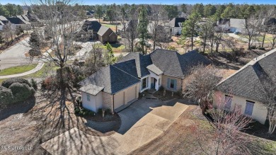 CLICK ON VIRTUAL TOURWelcome to this beautifully updated home on Lake Caroline Golf Club in Mississippi - for sale on GolfHomes.com, golf home, golf lot
