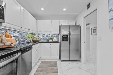 GORGEOUS 2/2 Newly Remodeled Unit in Palm Aire offers everything on Palm-Aire Country Club and Resort - Palms in Florida - for sale on GolfHomes.com, golf home, golf lot