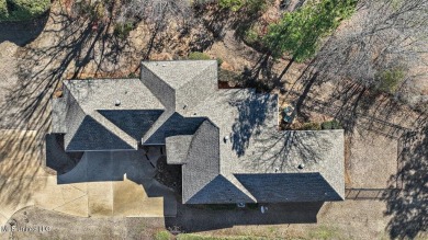 CLICK ON VIRTUAL TOURWelcome to this beautifully updated home on Lake Caroline Golf Club in Mississippi - for sale on GolfHomes.com, golf home, golf lot