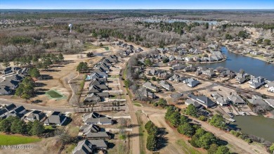 CLICK ON VIRTUAL TOURWelcome to this beautifully updated home on Lake Caroline Golf Club in Mississippi - for sale on GolfHomes.com, golf home, golf lot