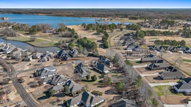 CLICK ON VIRTUAL TOURWelcome to this beautifully updated home on Lake Caroline Golf Club in Mississippi - for sale on GolfHomes.com, golf home, golf lot