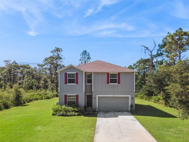 Welcome to your dream home in the peaceful community of Indian on Indian Lake Estates Golf and Country Club in Florida - for sale on GolfHomes.com, golf home, golf lot