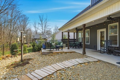 Better than new and truly turnkey, this exceptional ZERO-ENTRY on Toqua Golf Course - Loudon County in Tennessee - for sale on GolfHomes.com, golf home, golf lot