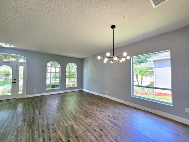 Under contract-accepting backup offers. One or more photo(s) has on Kings Ridge Golf Club in Florida - for sale on GolfHomes.com, golf home, golf lot