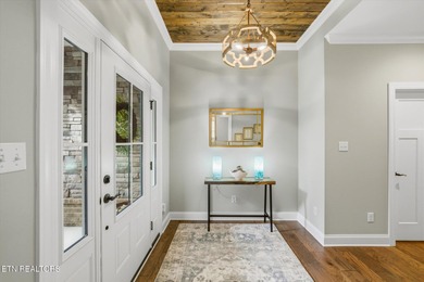 Better than new and truly turnkey, this exceptional ZERO-ENTRY on Toqua Golf Course - Loudon County in Tennessee - for sale on GolfHomes.com, golf home, golf lot