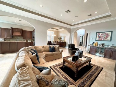 Impeccably Maintained Lakefront Tesoro Estate! This Former Model on The Tesoro Golf Course and Club in Florida - for sale on GolfHomes.com, golf home, golf lot