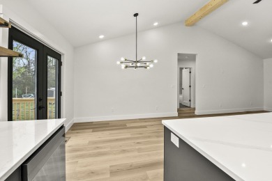 This stunning new home combines quality craftsmanship with on Bill and Payne Stewart Golf Course  in Missouri - for sale on GolfHomes.com, golf home, golf lot