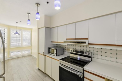 Start your day with glowing sunrise views across Sarasota Bay on Longboat Key Golf Club Resort in Florida - for sale on GolfHomes.com, golf home, golf lot