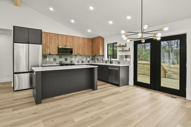 This stunning new home combines quality craftsmanship with on Bill and Payne Stewart Golf Course  in Missouri - for sale on GolfHomes.com, golf home, golf lot