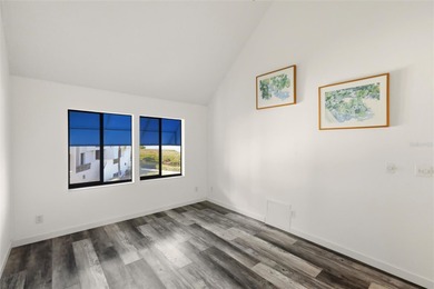 Start your day with glowing sunrise views across Sarasota Bay on Longboat Key Golf Club Resort in Florida - for sale on GolfHomes.com, golf home, golf lot