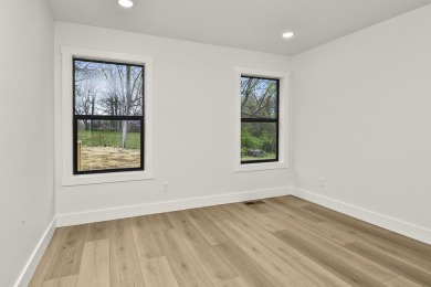 This stunning new home combines quality craftsmanship with on Bill and Payne Stewart Golf Course  in Missouri - for sale on GolfHomes.com, golf home, golf lot
